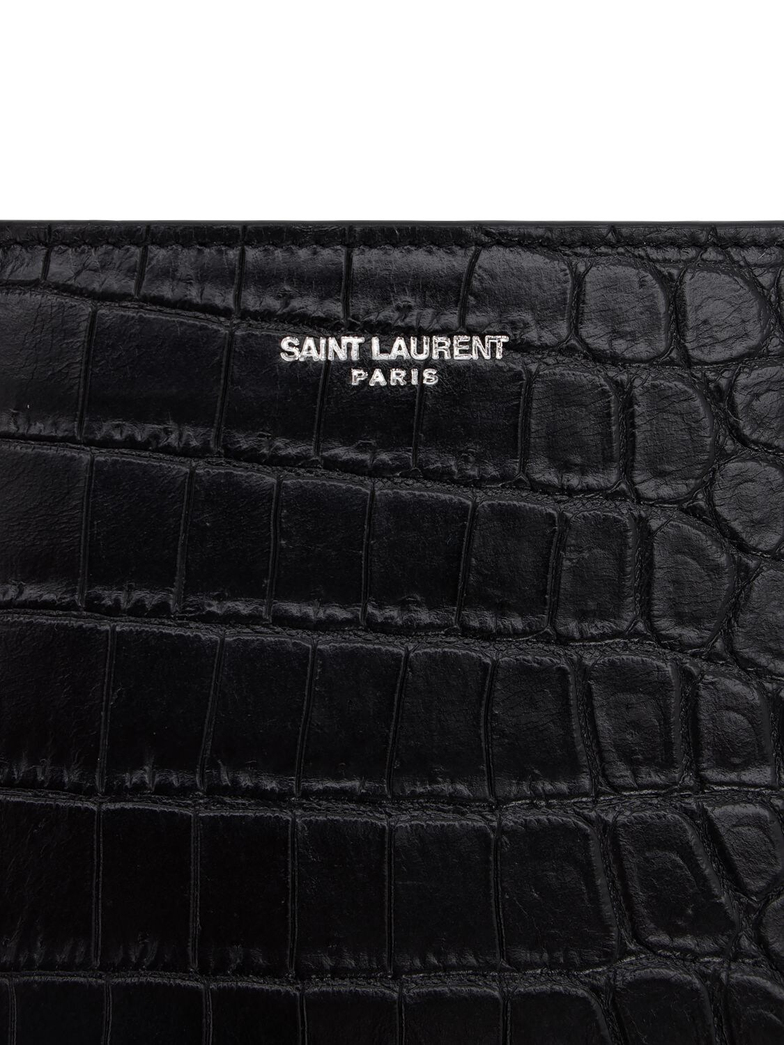 Shop Saint Laurent East West Embossed Leather Wallet In Black