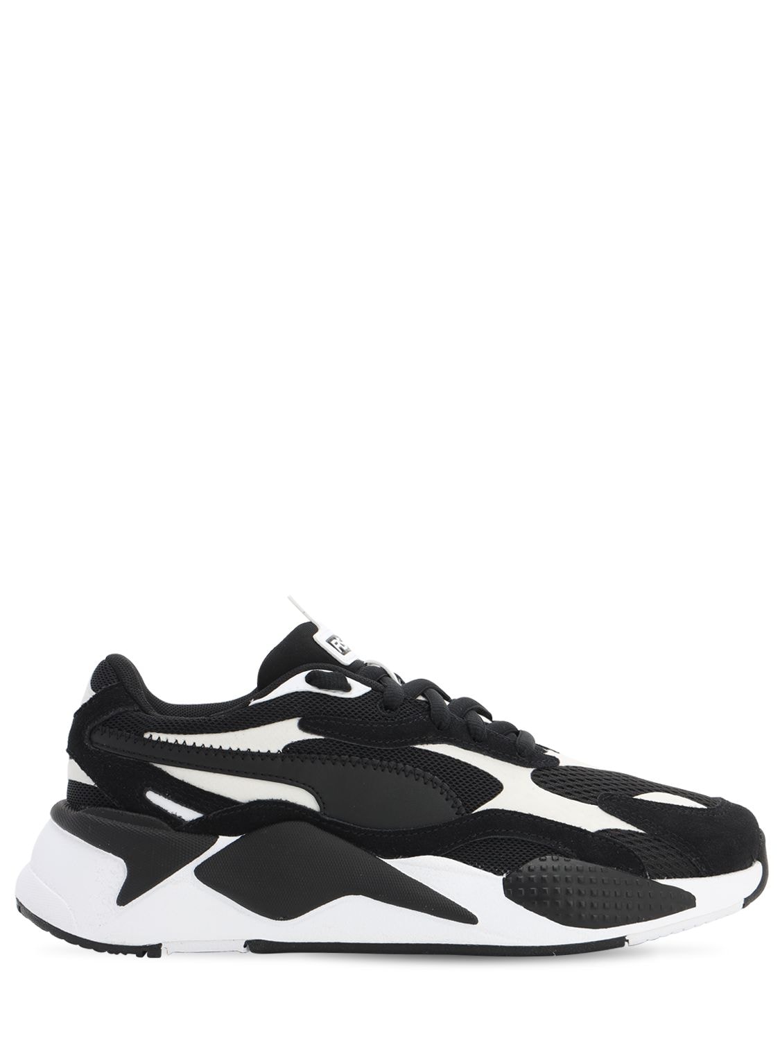 black and white leather pumas