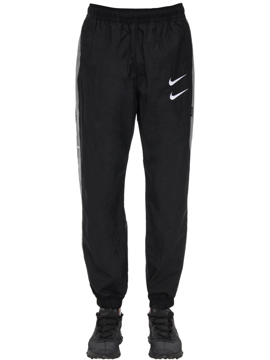 Nike Nsw Swoosh Woven Nylon Pants In Black