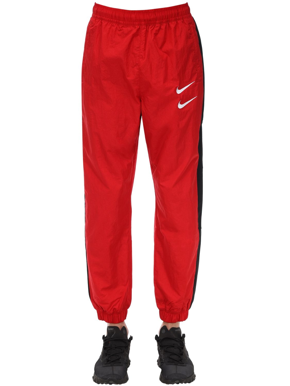 Nike Nsw Swoosh Woven Nylon Pants In University Red