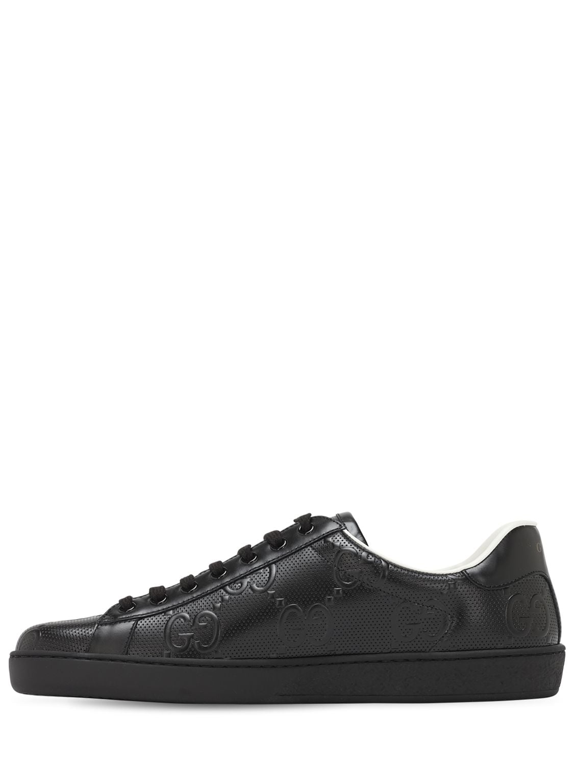 Shop Gucci New Ace Gg Embossed Leather Sneakers In Black