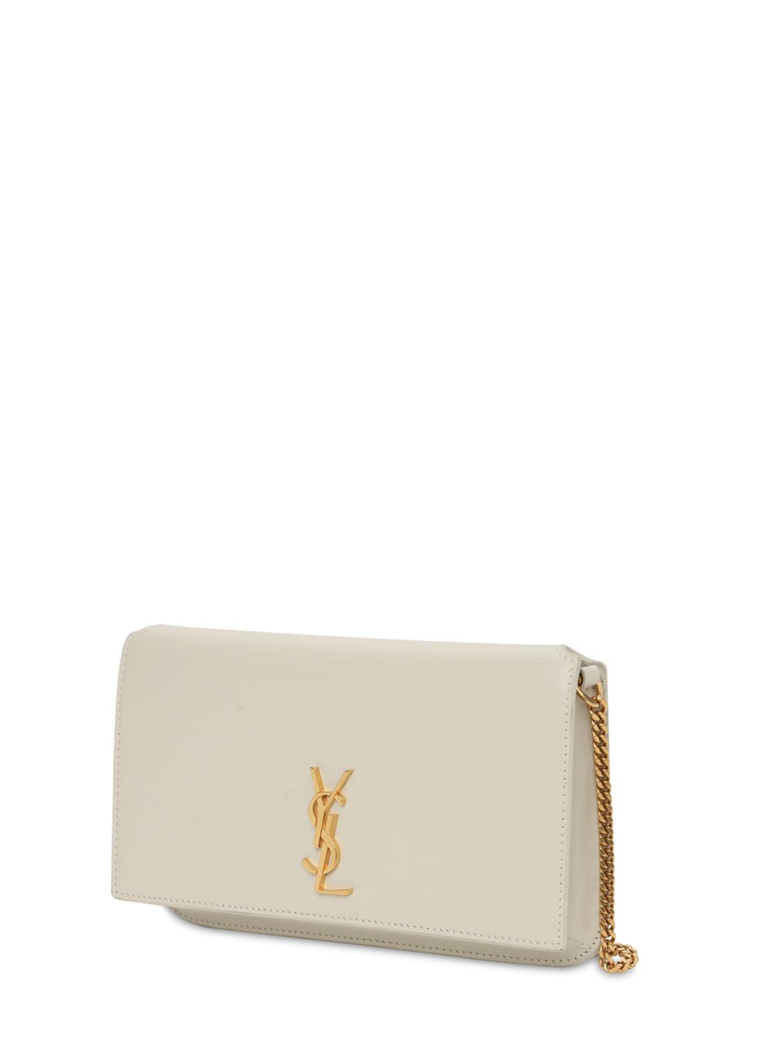 Shop Saint Laurent Monogram Leather Phone Holder W/ Strap In Blanc Vintage