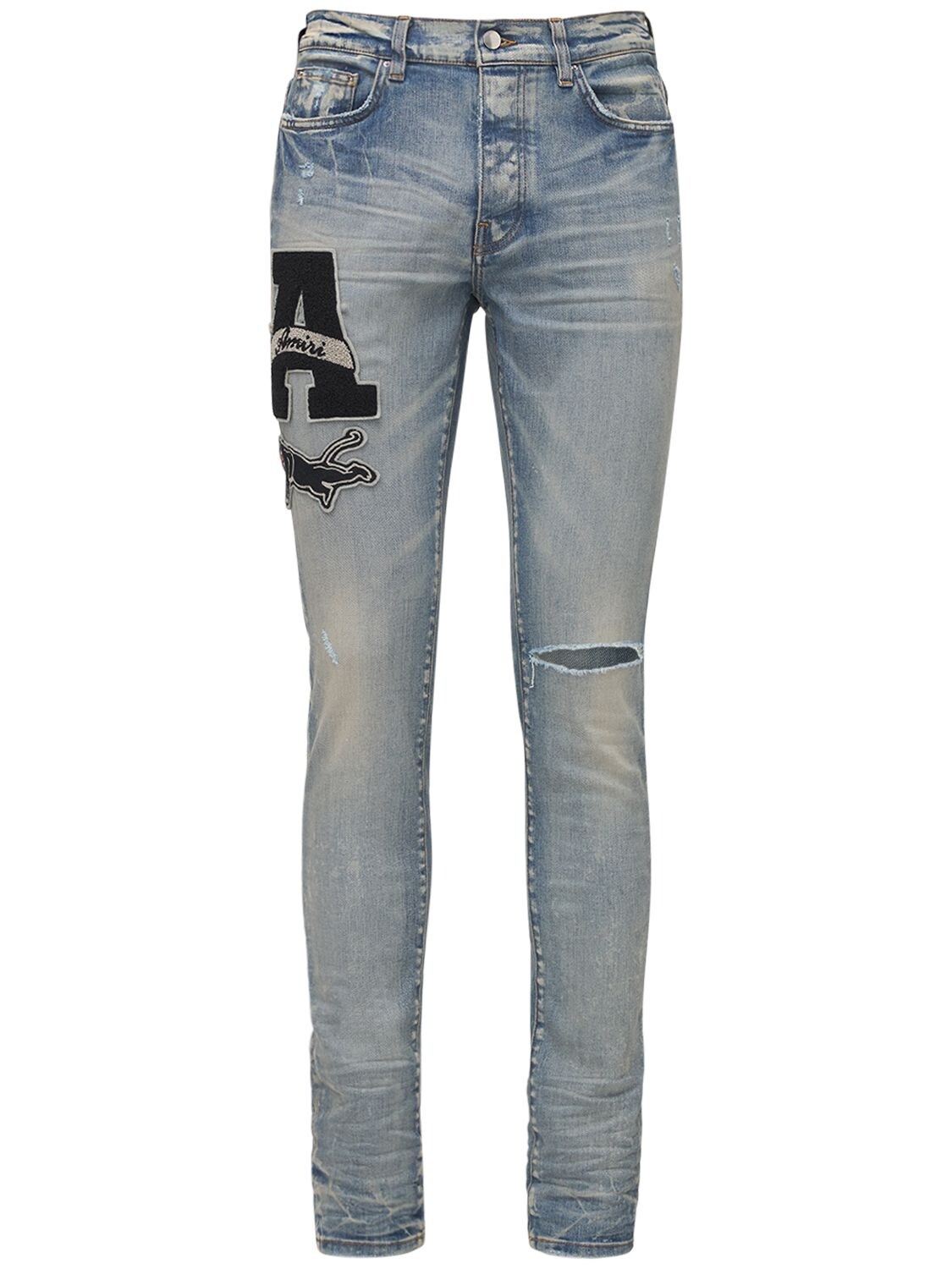 Amiri - Varsity patch denim jeans - | Luisaviaroma