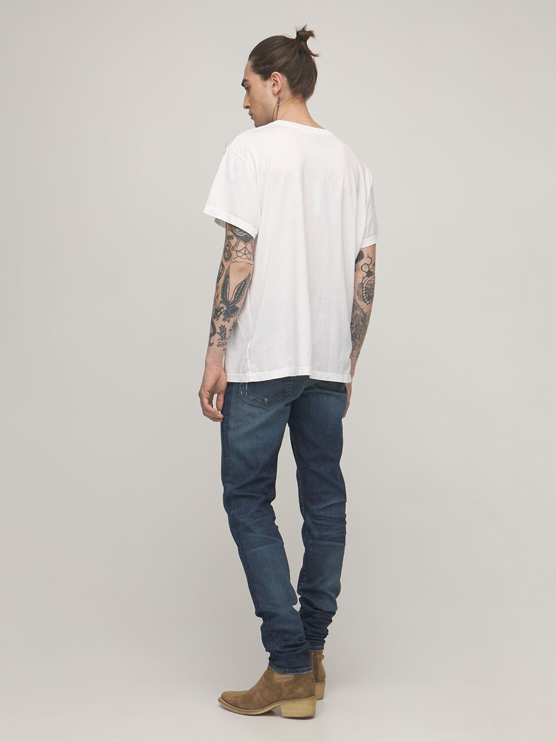 Shop Amiri 15cm Stack Cotton Denim Jeans In Deep Indigo