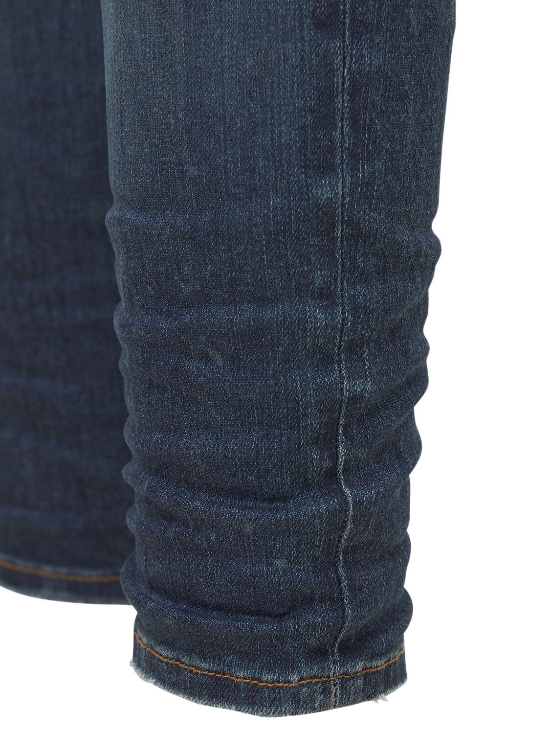 Shop Amiri 15cm Stack Cotton Denim Jeans In Deep Indigo