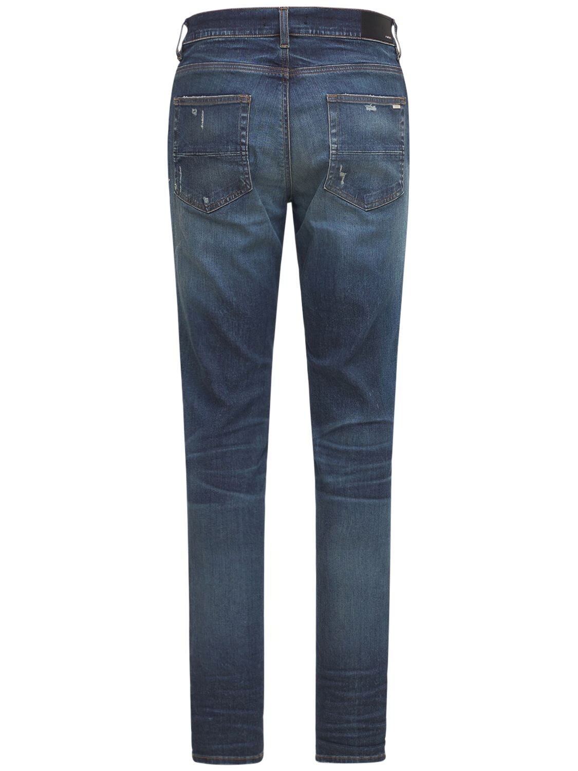 Shop Amiri 15cm Stack Cotton Denim Jeans In Deep Indigo