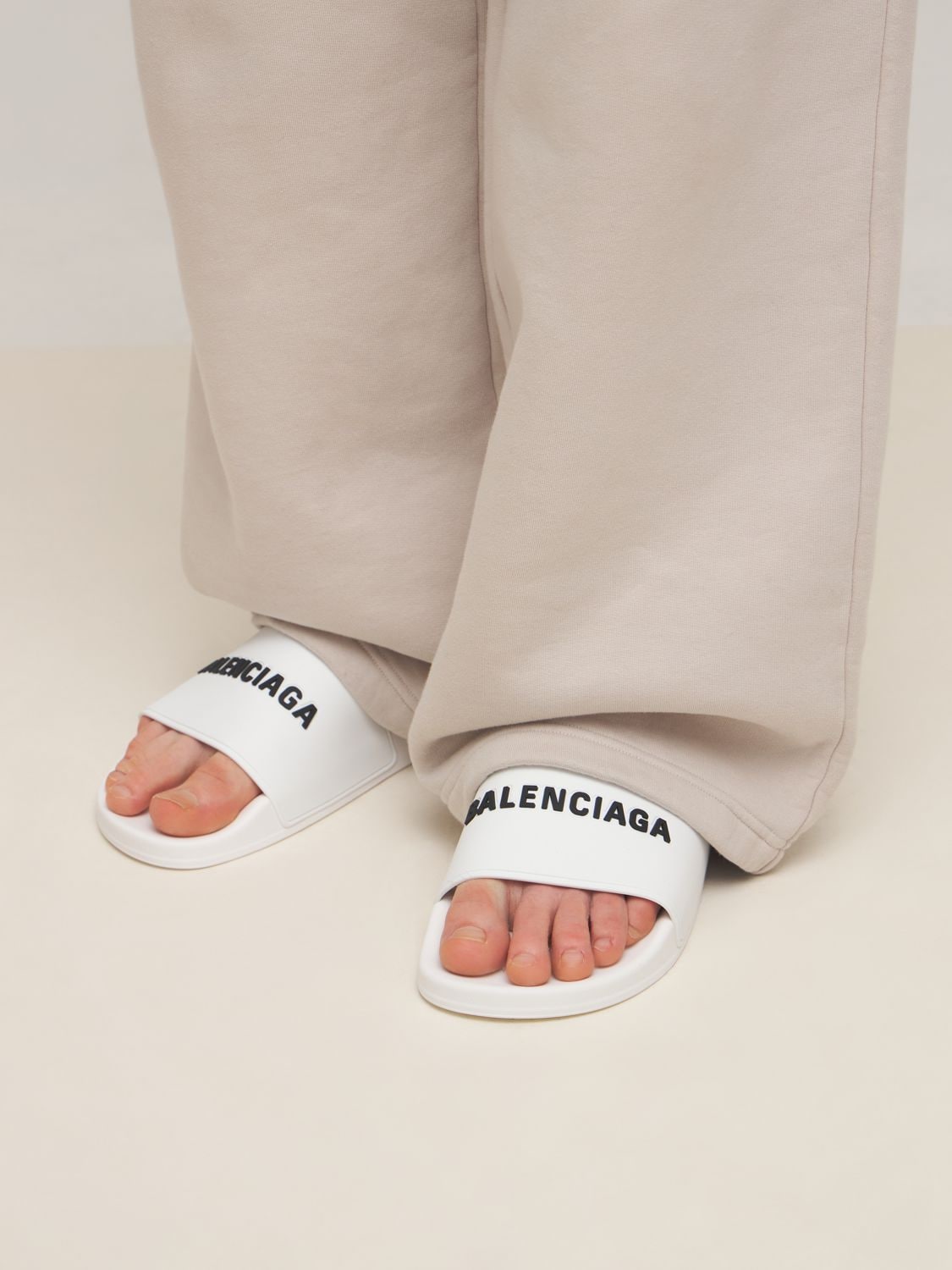 Shop Balenciaga Logo Rubber Pool Slide Sandals In White,black