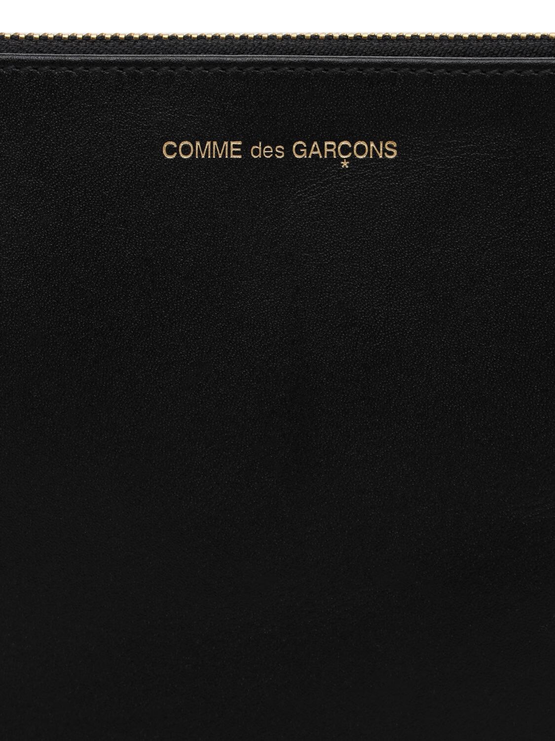 Shop Comme Des Garçons Logo Leather Pouch In Black