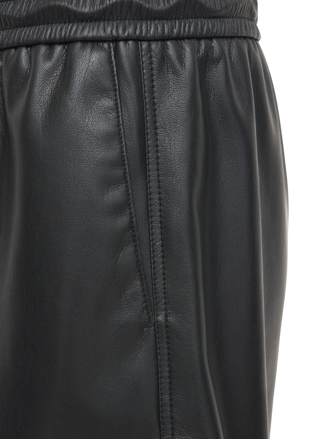 Shop Nanushka Faux Leather Sweat Shorts In Black