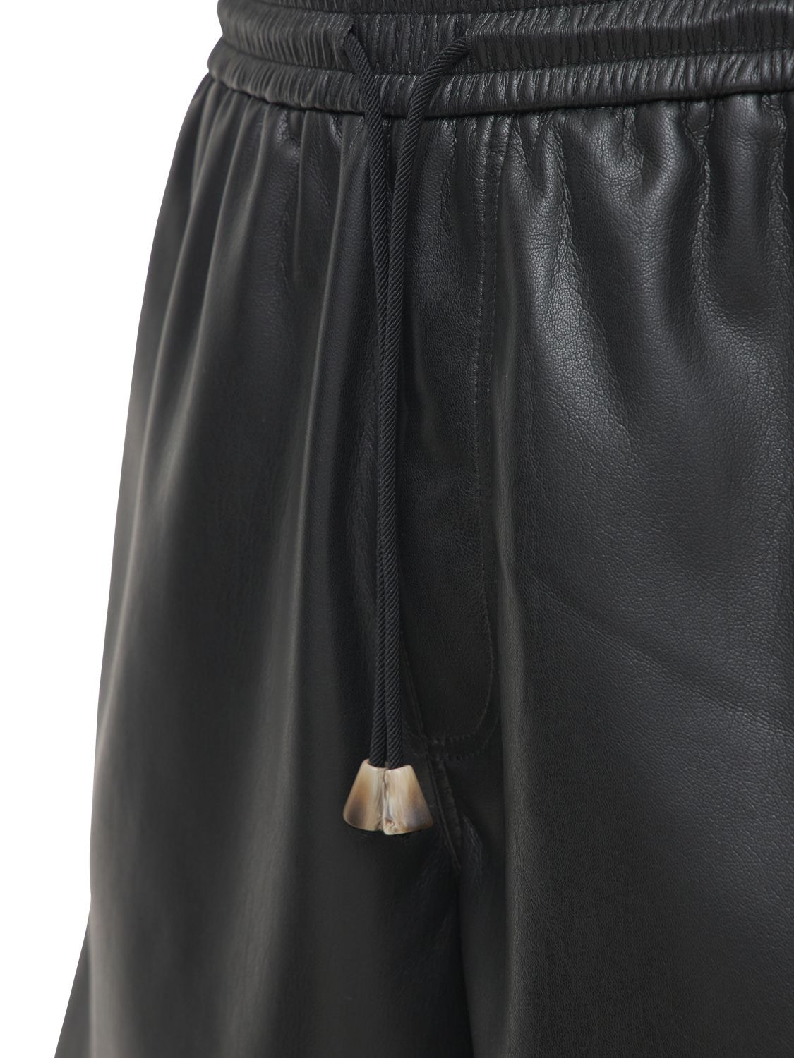 Shop Nanushka Faux Leather Sweat Shorts In Black