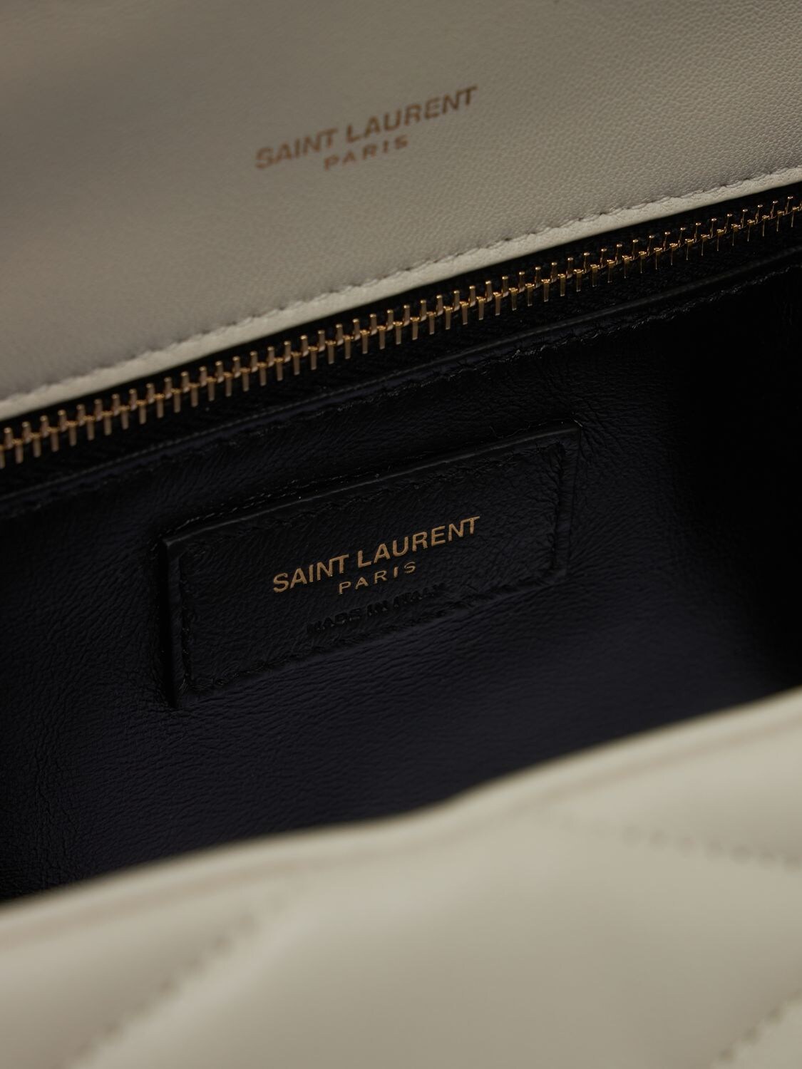 Shop Saint Laurent Puffer Leather Sade Clutch In Crema Soft