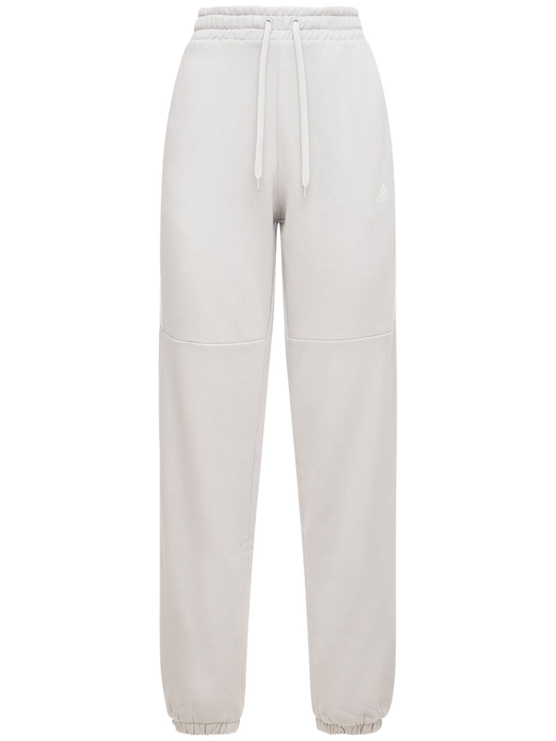 grey adidas sweatpants with white stripes