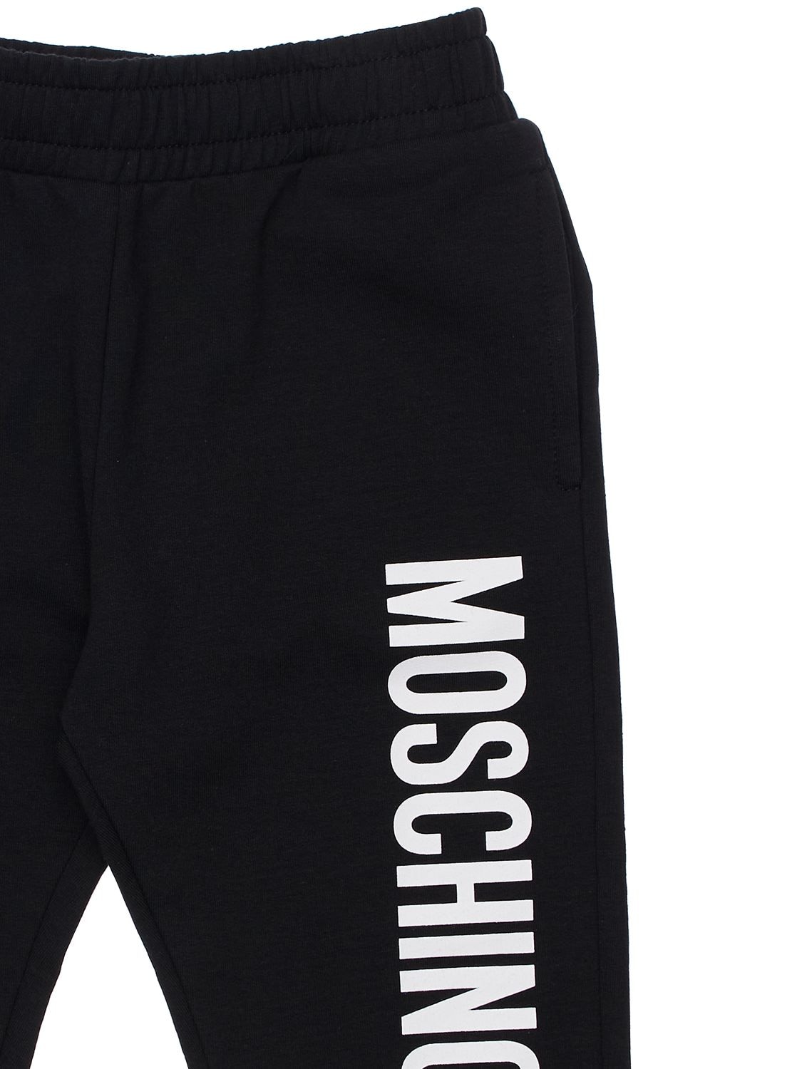 Shop Moschino Logo Print Cotton Sweatpants In Black