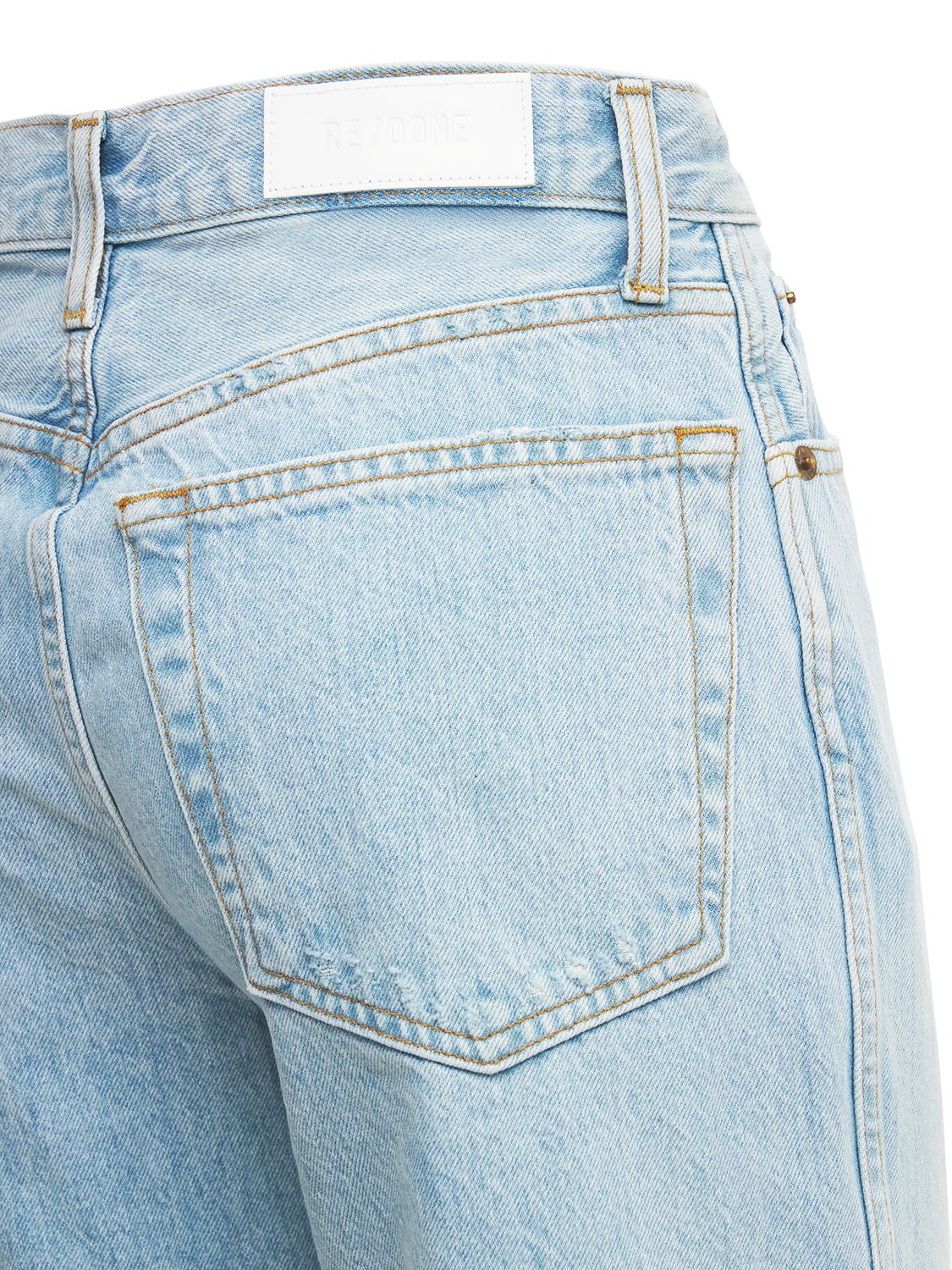 Shop Re/done 90s High-rise Distressed Loose Jeans In Bleached Blue