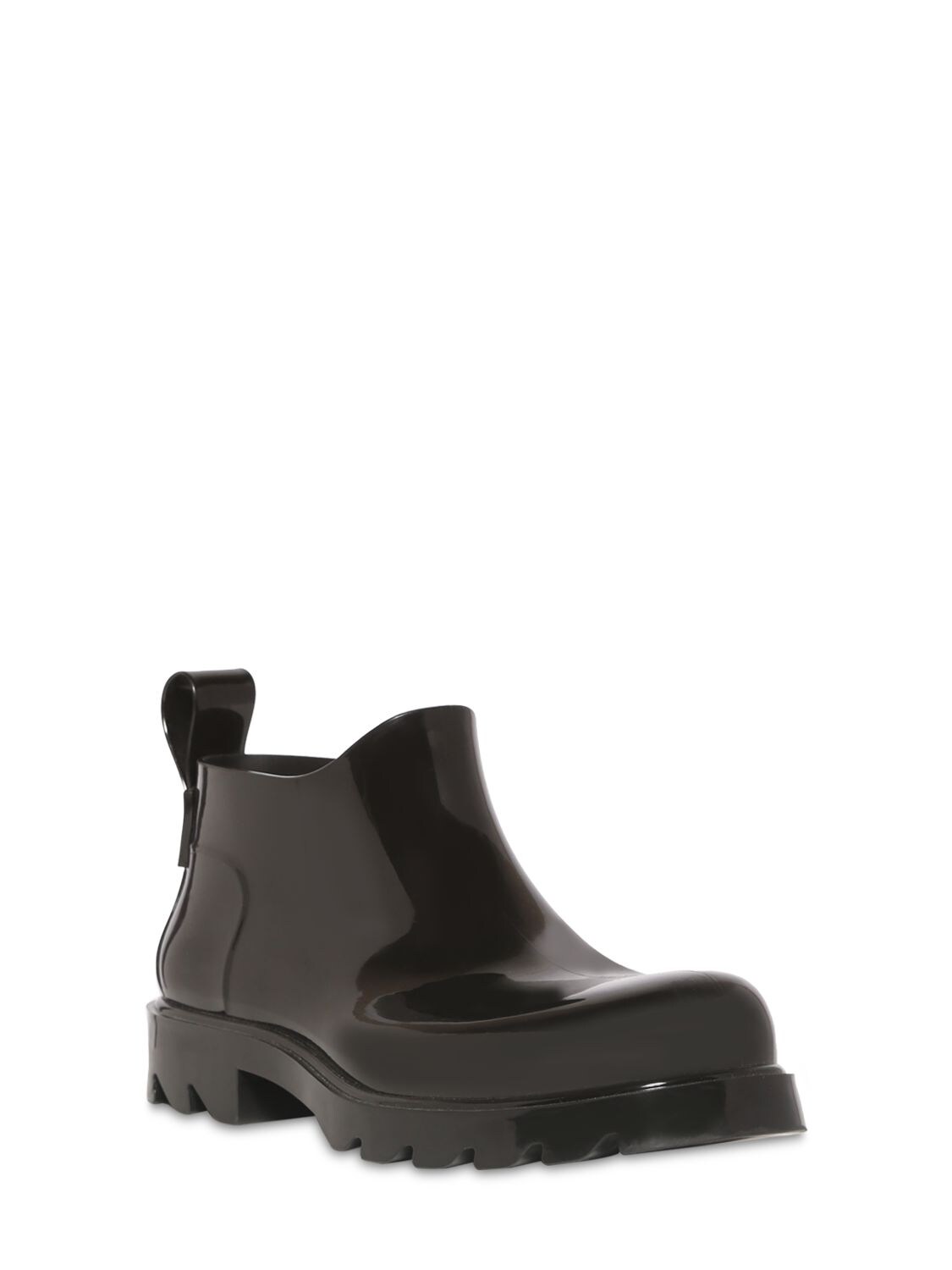 Bottega Veneta Stride Ankle Boots In Shiny Rubber In Black | ModeSens