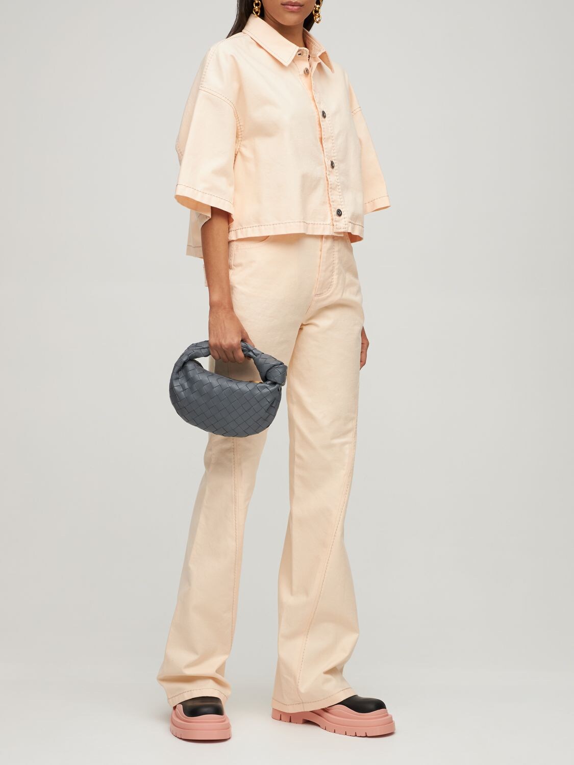 Shop Bottega Veneta Mini Jodie Leather Top Handle Bag In Thunder-gold