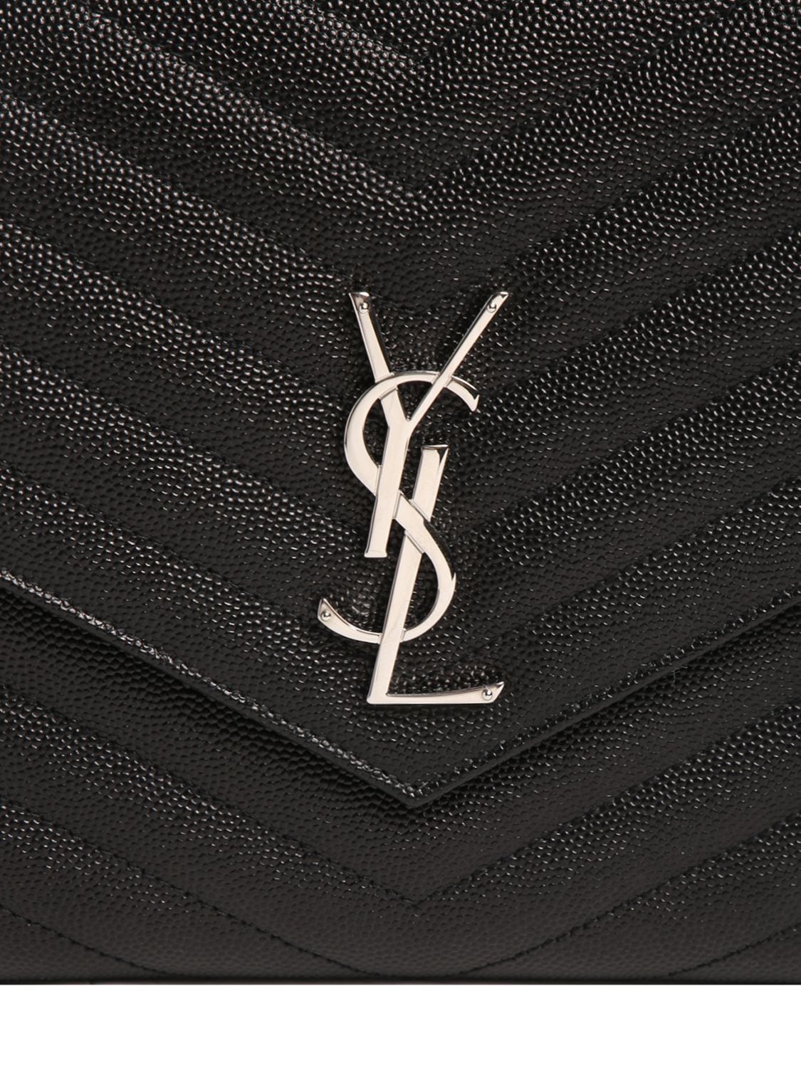 Shop Saint Laurent Monogram Embossed Leather Clutch In Black