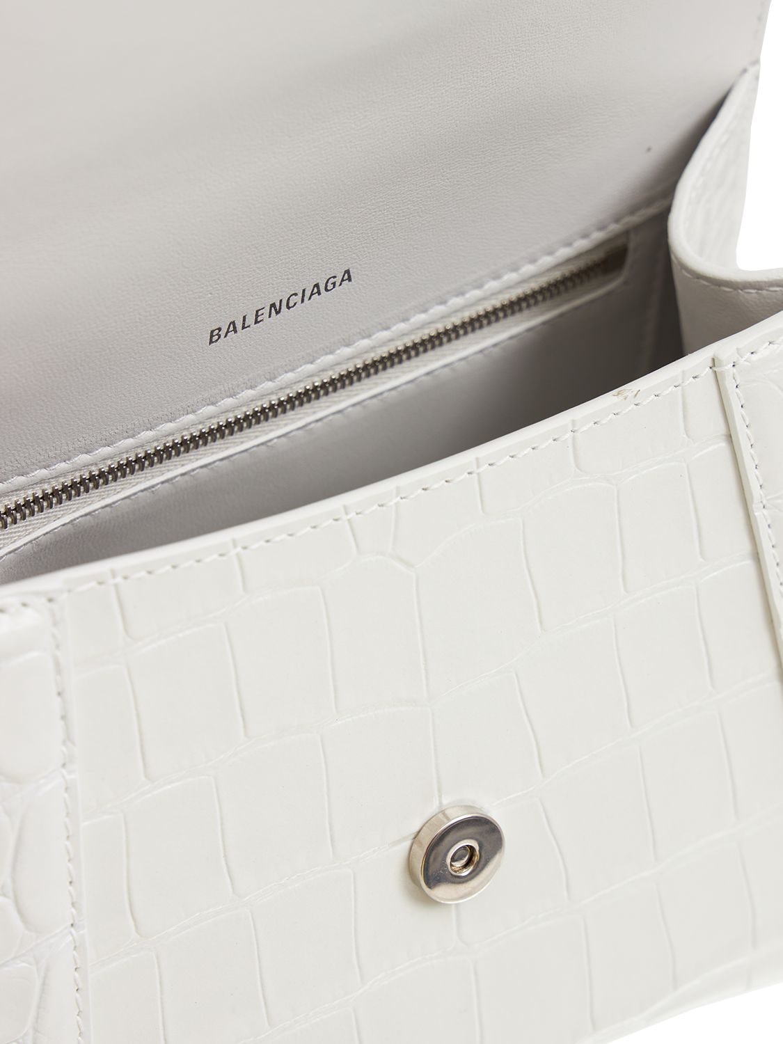 Shop Balenciaga Small Hourglass Embossed Leather Bag In White