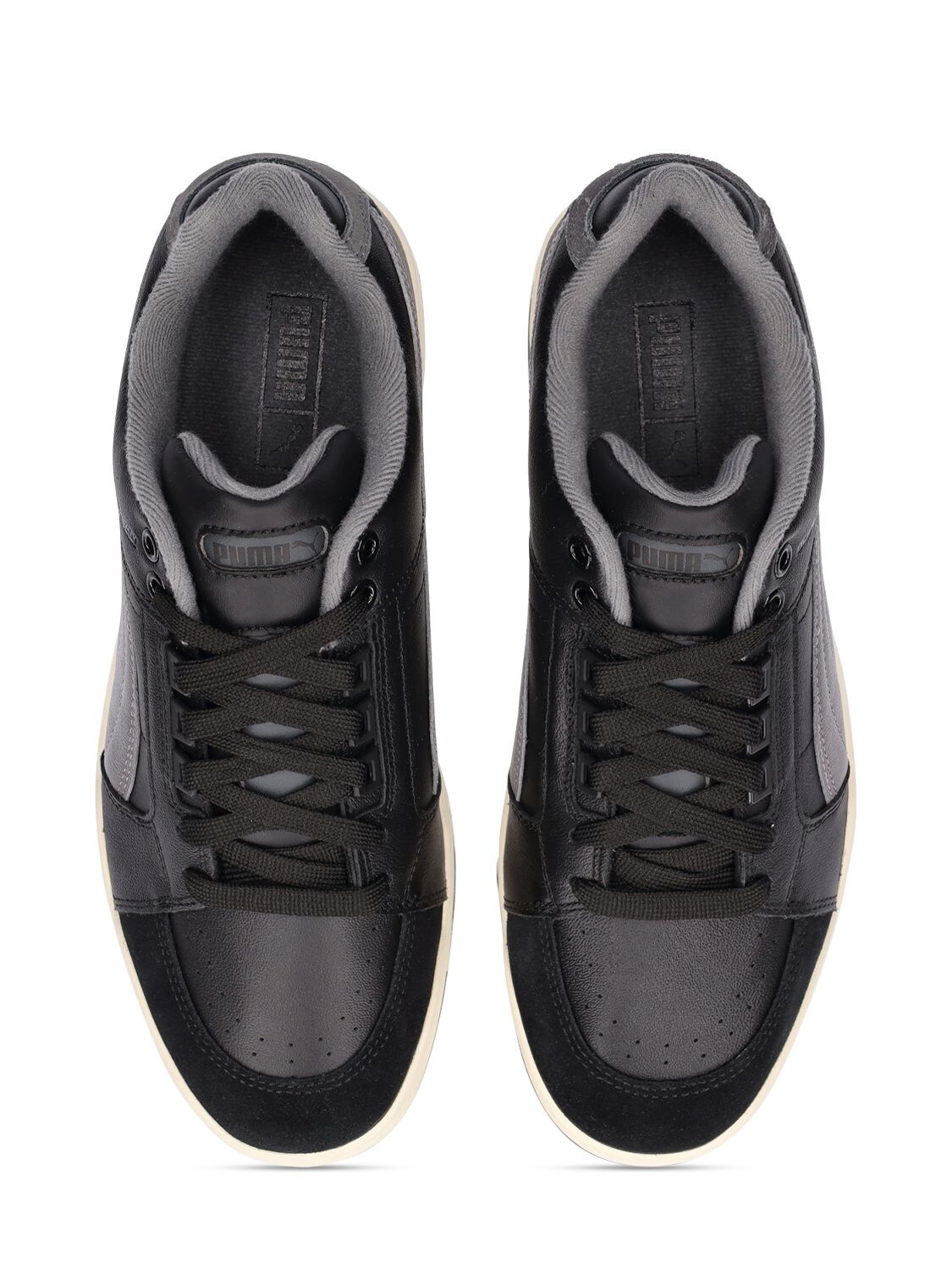 Puma Slipstream Low Retro Leather Sneakers in Black | Stylemi