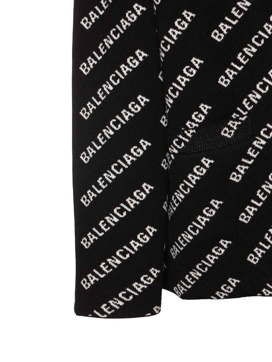 Shop Balenciaga Logo Wool Blend Knit Cardigan In Чёрный