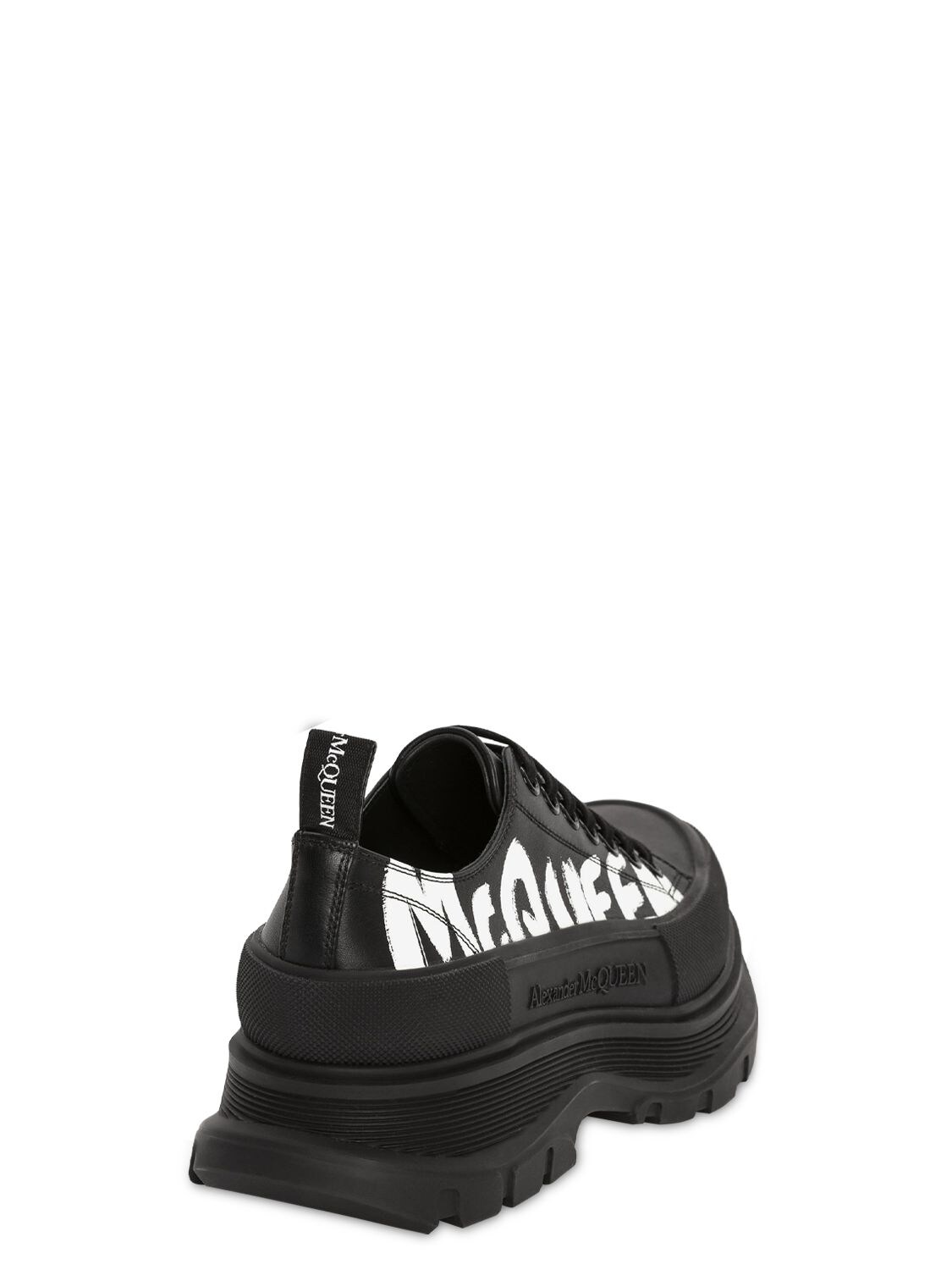 Shop Alexander Mcqueen Tread Slick Leather Sneakers In Black,white