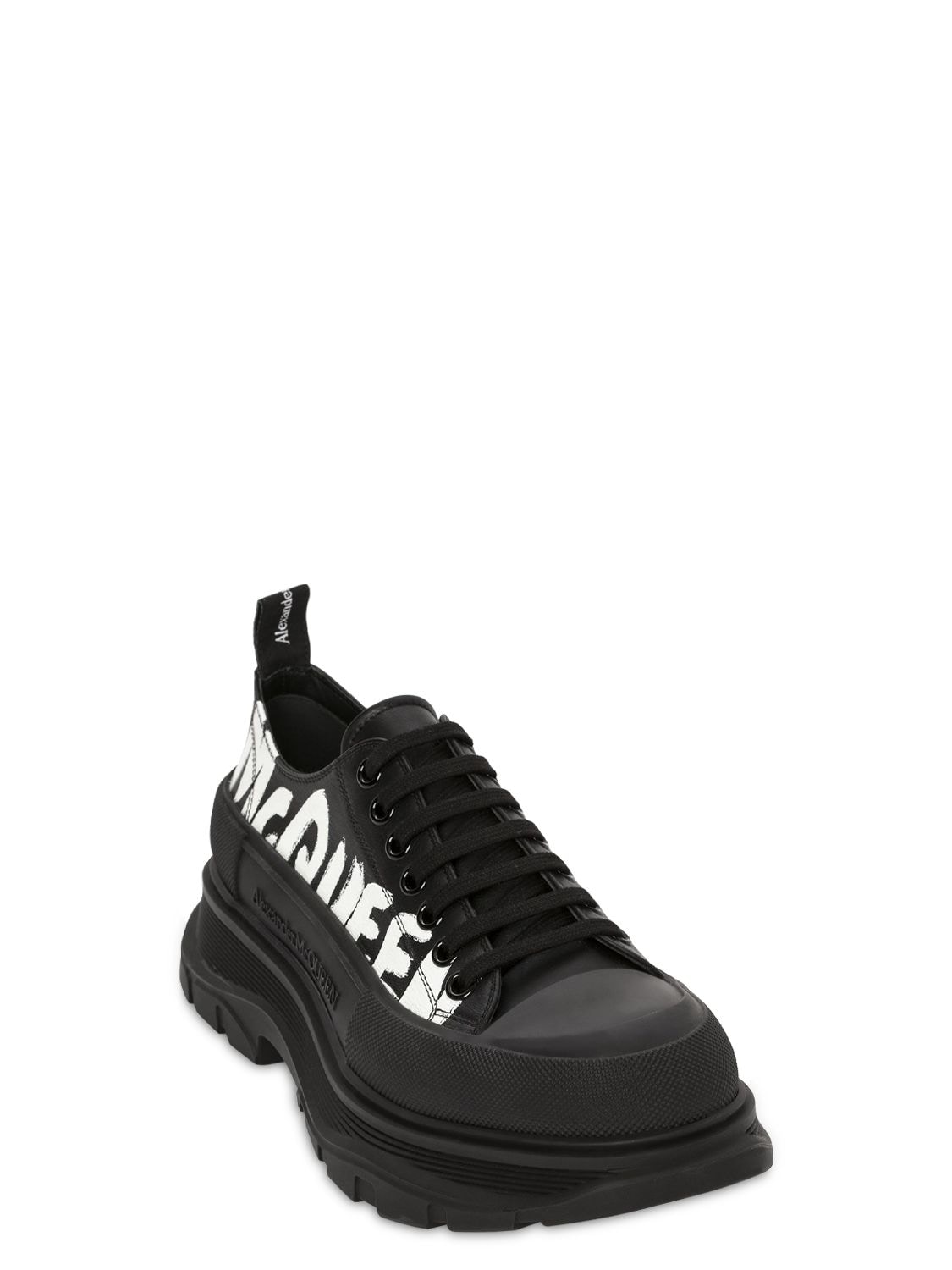 Shop Alexander Mcqueen Tread Slick Leather Sneakers In Black,white