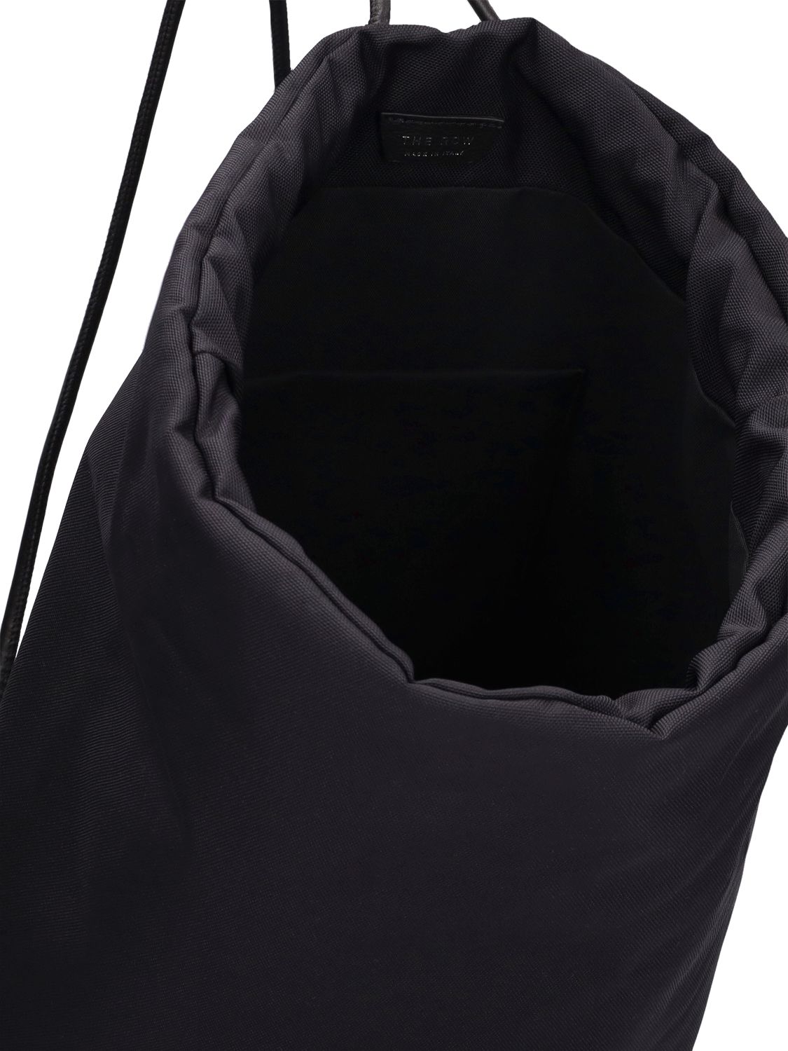 The Row Sporty Faux Leather Backpack In Black ModeSens