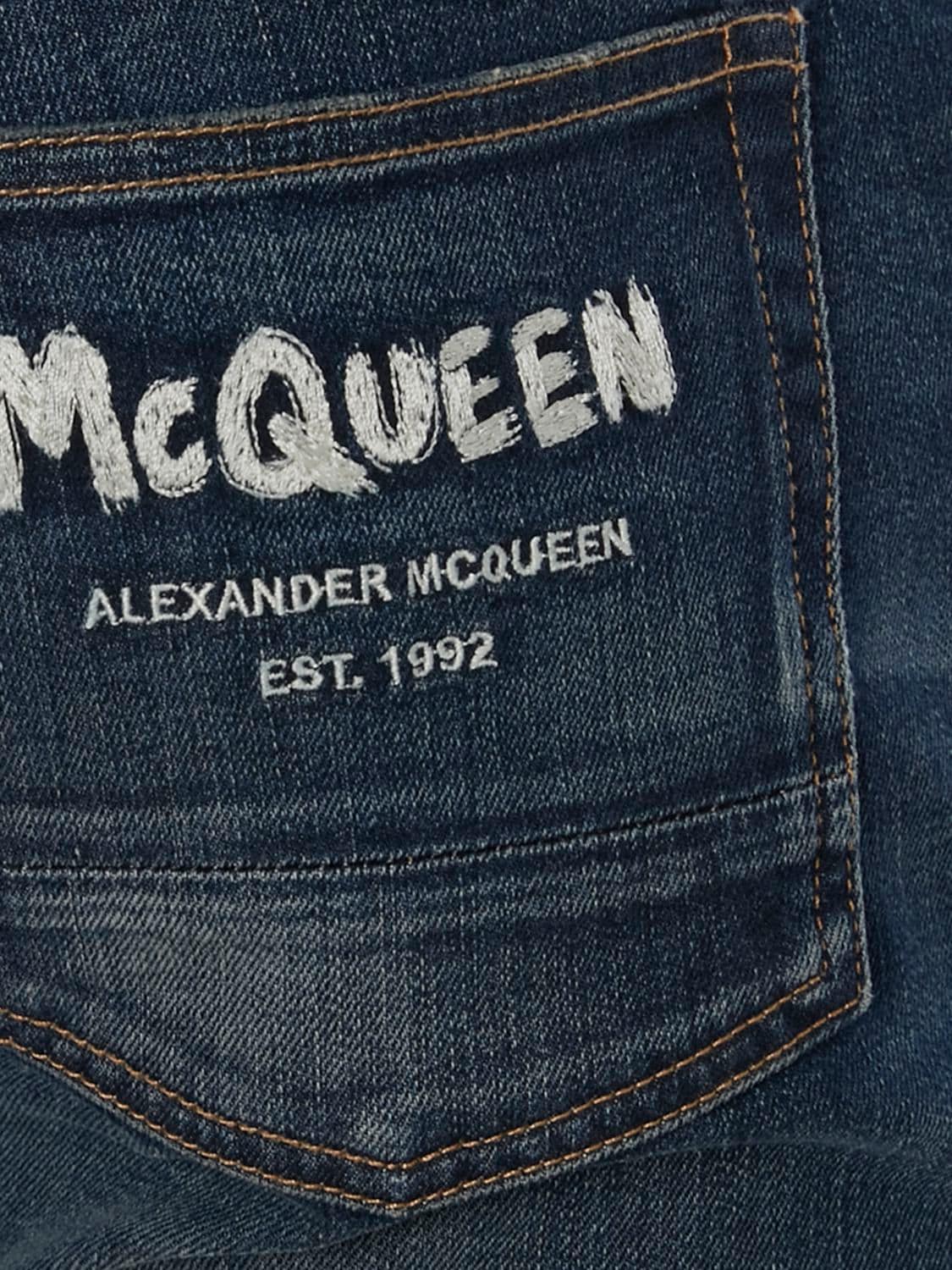 Shop Alexander Mcqueen Stonewashed Cotton Denim Jeans In Blue Wash