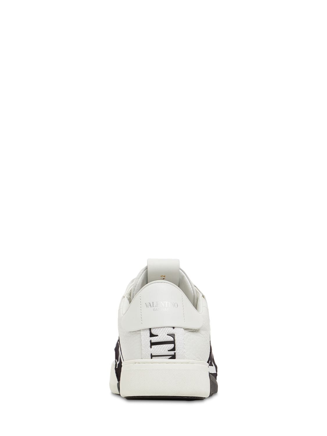 Shop Valentino Vl7n Leather Sneakers In White,black