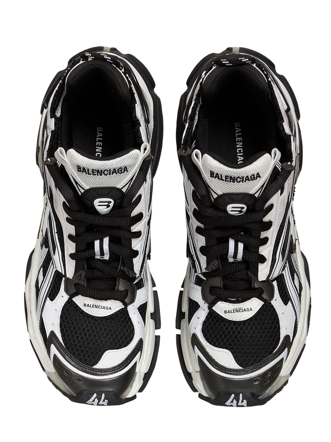 Shop Balenciaga Runner Sneakers In White,blac