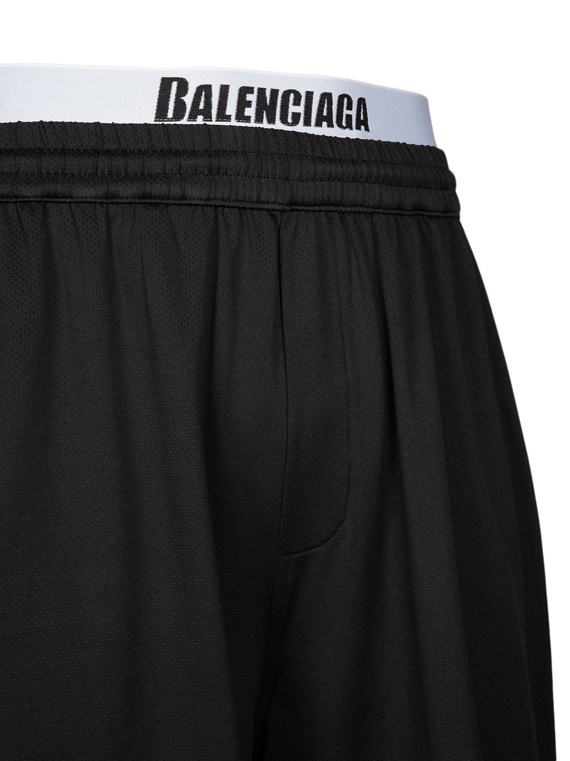 Shop Balenciaga Logo Nylon Swim Shorts In Black