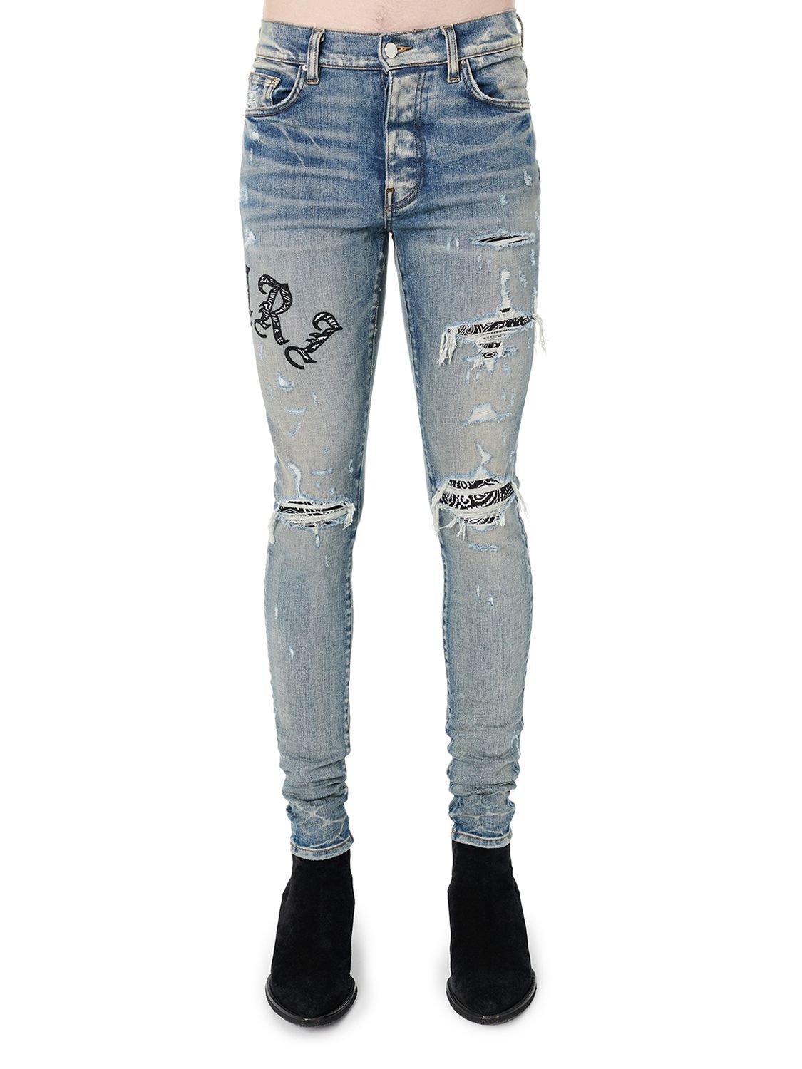 Amiri Skinny-fit Appliquéd Panelled Distressed Jeans In Clay Indigo