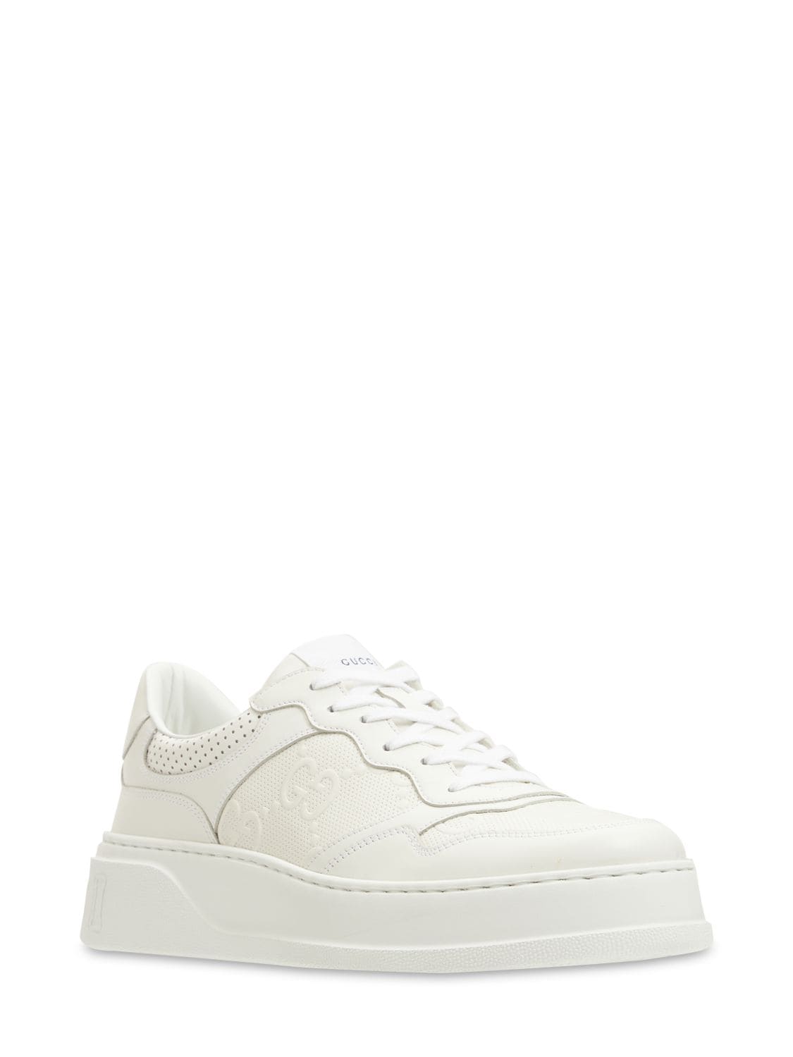 Shop Gucci Gg Embossed Leather Sneakers In White
