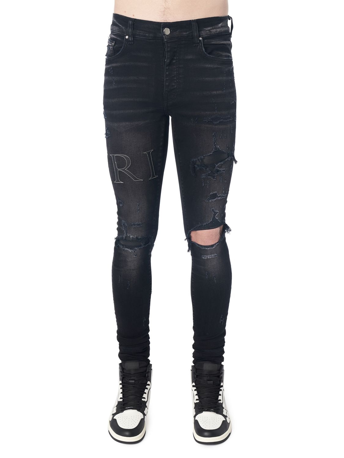 Amiri Stretch Denim Jeans W/ Leather Logo In Aged Black