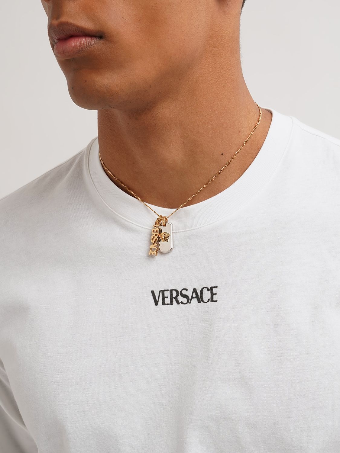 Shop Versace Medusa Tag &  Logo Necklace In Gold,silver