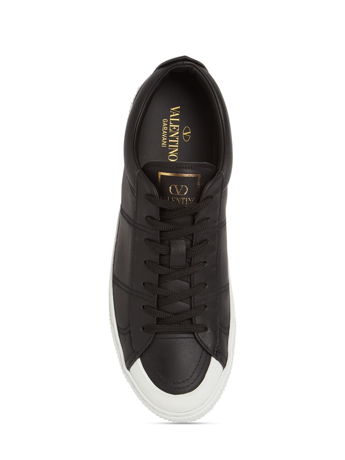 Valentino Garavani Cityplanet Leather Low Sneakers in Black | Stylemi