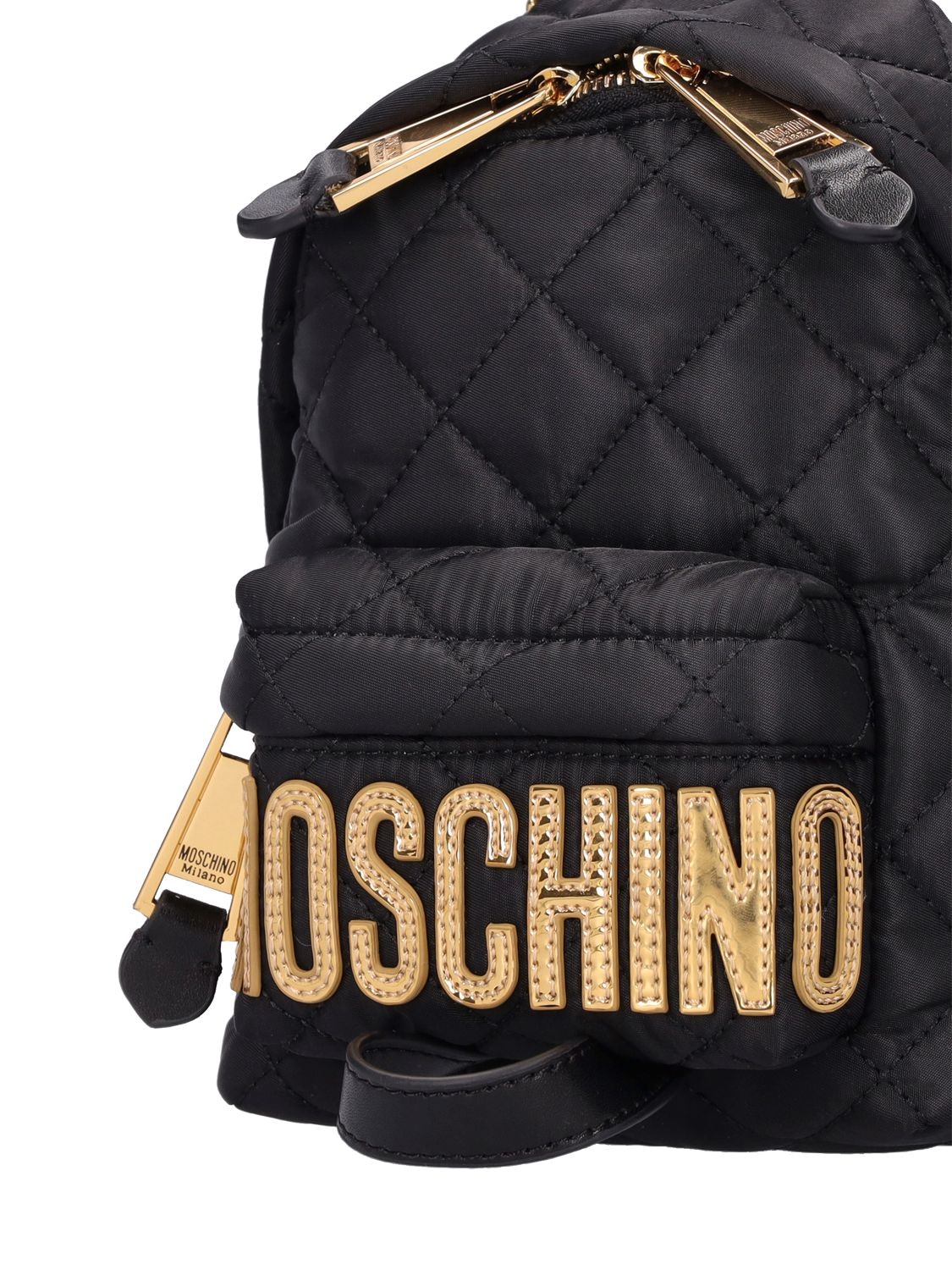 Shop Moschino Logo Quilted Mini Backpack In Black