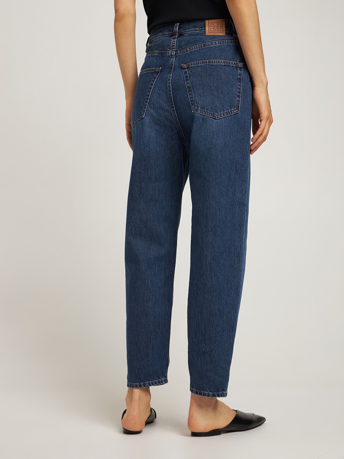 Shop Totême High Rise Tapered Organic Cotton Jeans In Blue