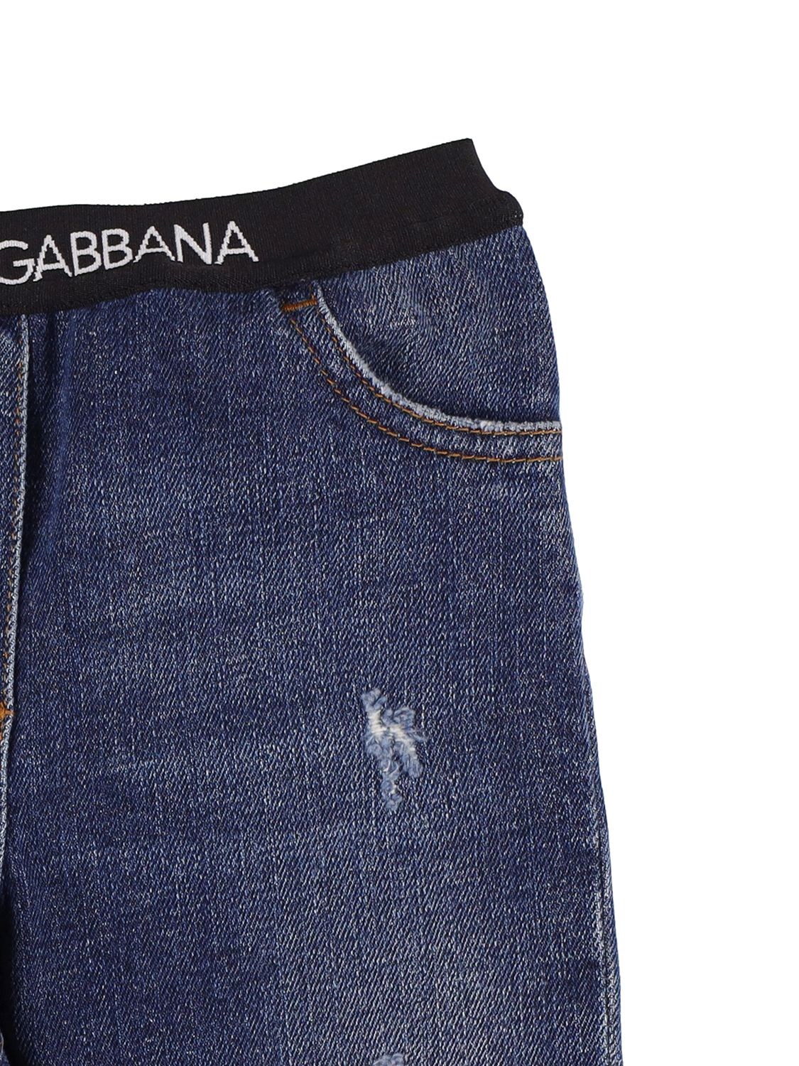 Dolce & Gabbana Logo Print Washed Denim Effect Pants In Denim