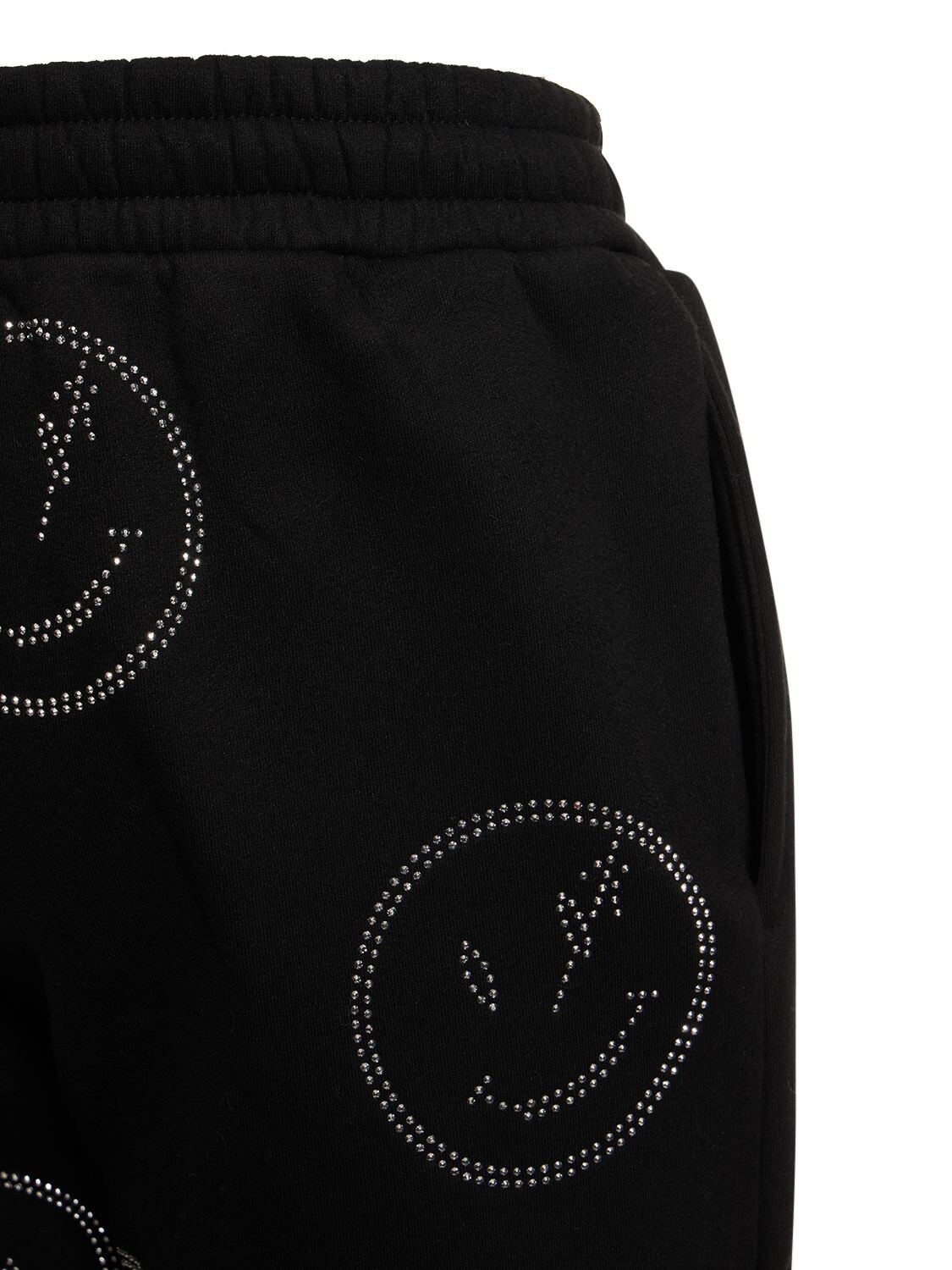 sweatpants with smiley face