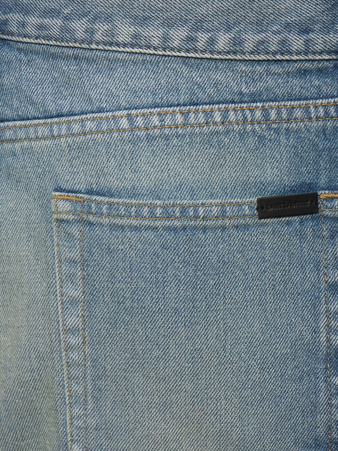 Shop Saint Laurent 70's Flared Cotton Jeans In Blue