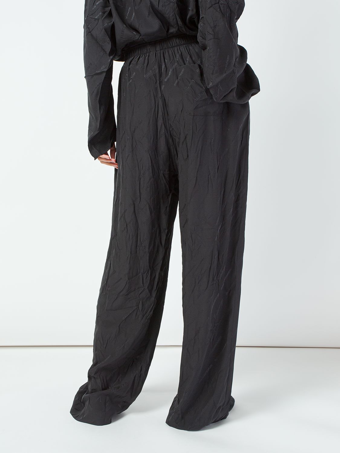 Shop Balenciaga Allover Logomania Jacquard Pants In Black