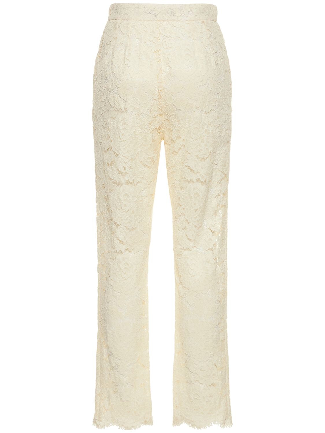 Shop Dolce & Gabbana High Rise Flared Lace Pants In White