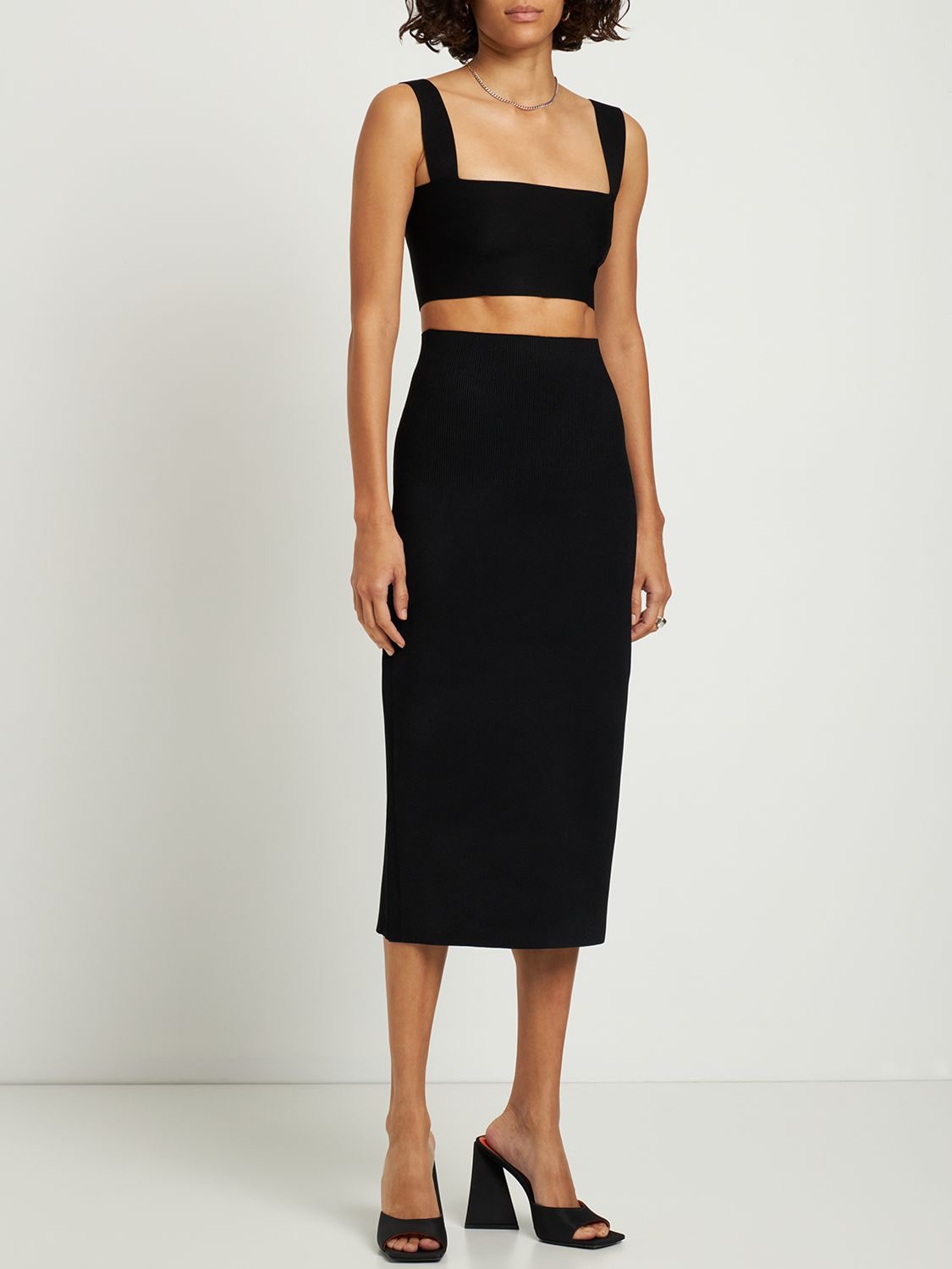 Shop Victoria Beckham Body Fitted Stretch Midi Skirt In Black