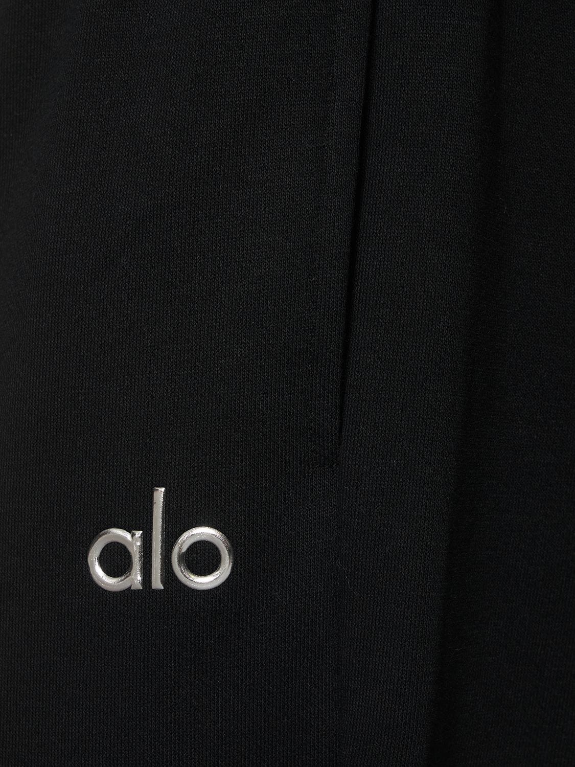 Shop Alo Yoga Fleece Accolade Straight Leg Sweatpants In Black