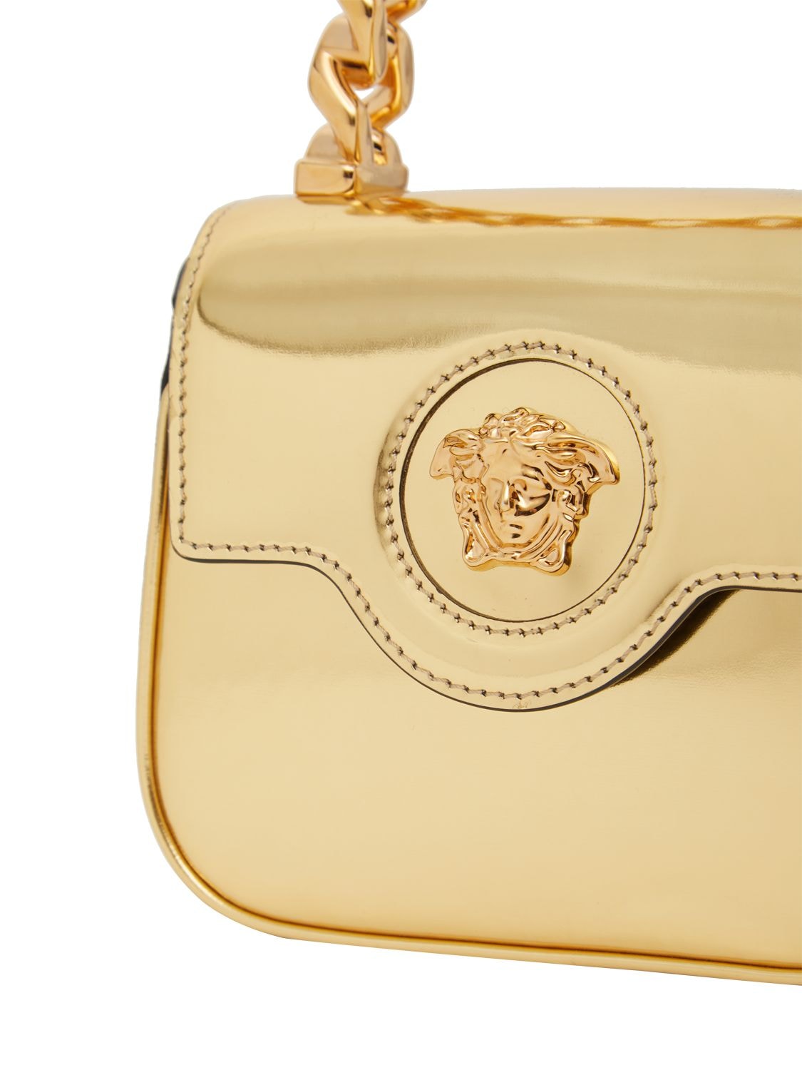 Shop Versace Mini Medusa Leather Top Handle Bag In Gold