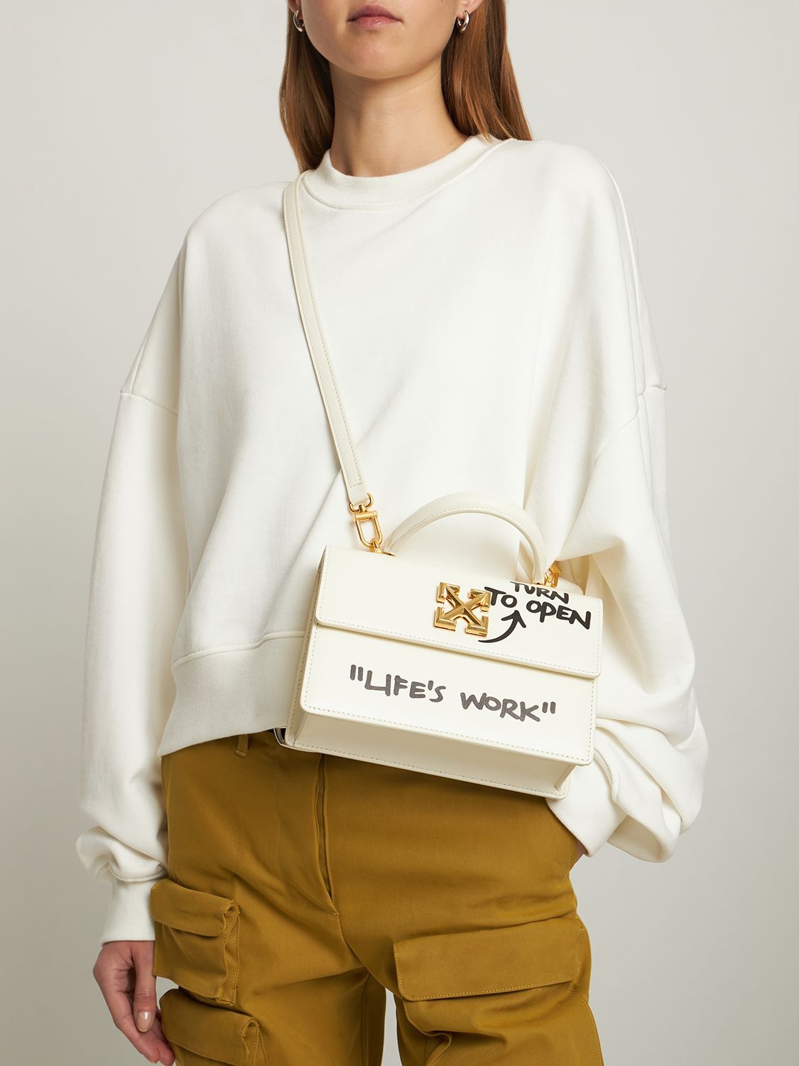 Shop Off-white Jitney 1.4 Leather Top Handle Bag In White