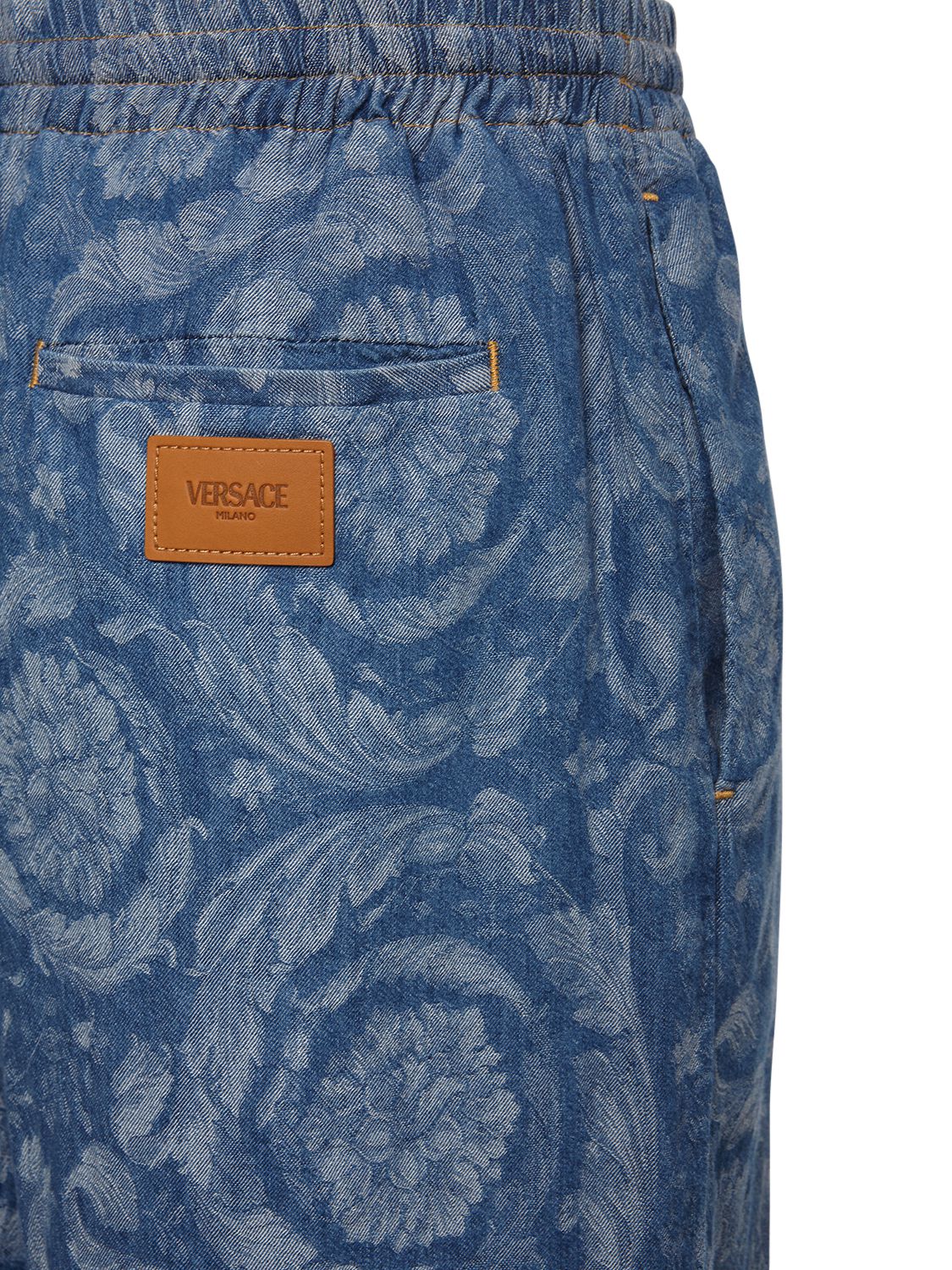 Versace Baroque Jacquard Denim Jeans In Blue