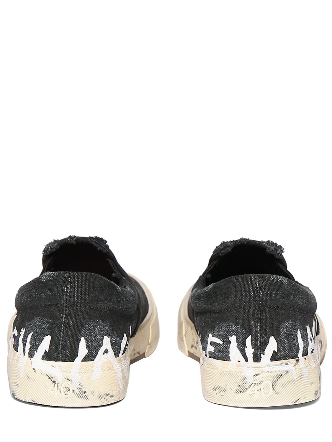 Shop Balenciaga Paris Slip-on Sneakers In Black,white