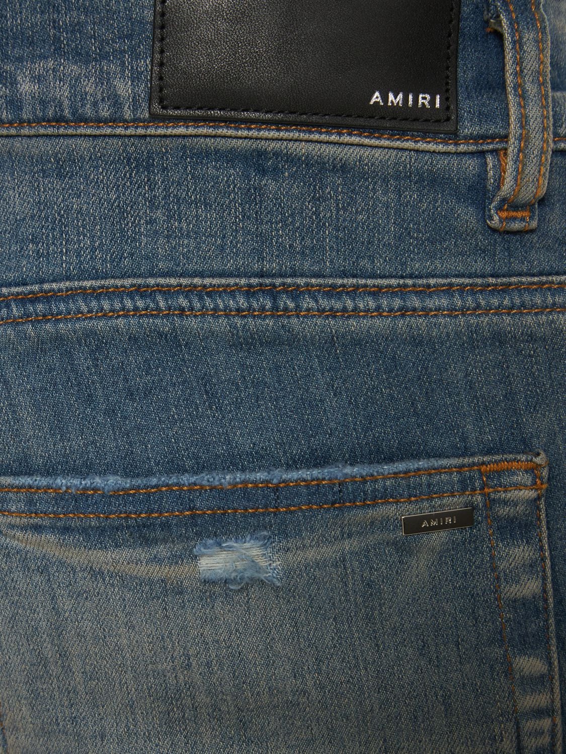 Shop Amiri Logo Distressed Jeans In Clay Indigo